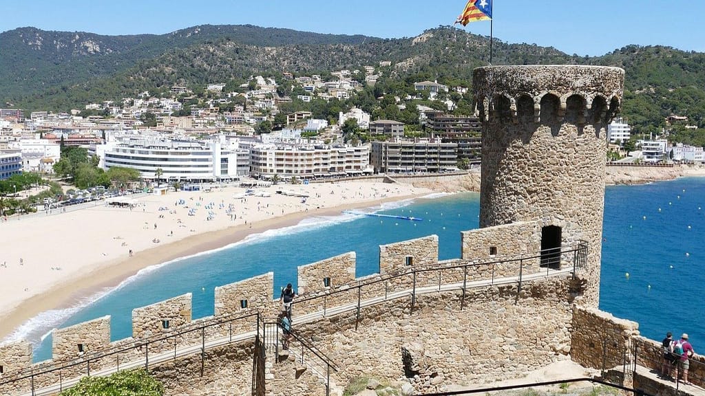 Tossa de Mar beach and medieval tower on the Costa Brava in Spain