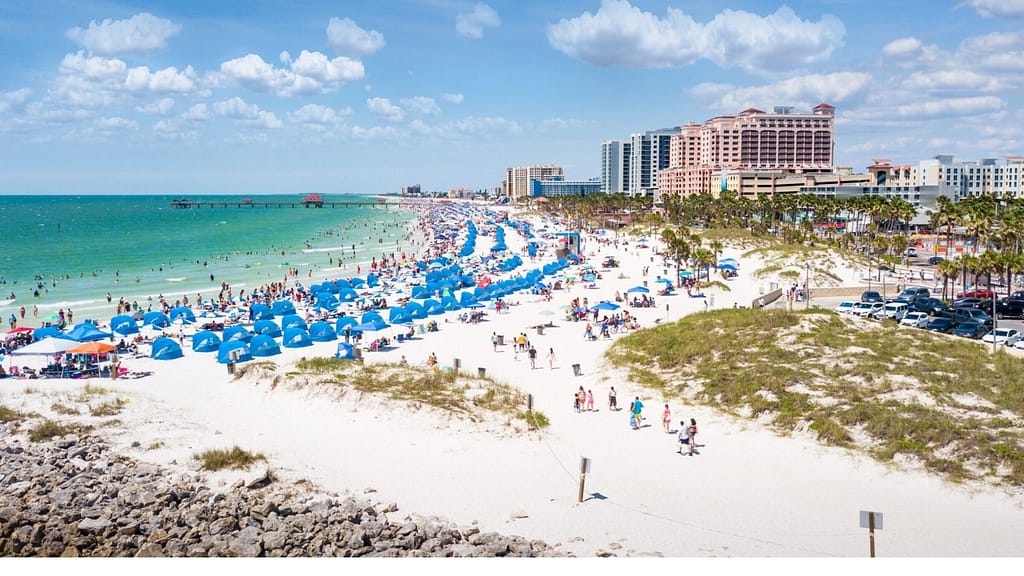 Clearwater Beach, Florida, with families enjoying the shoreline and sunset views