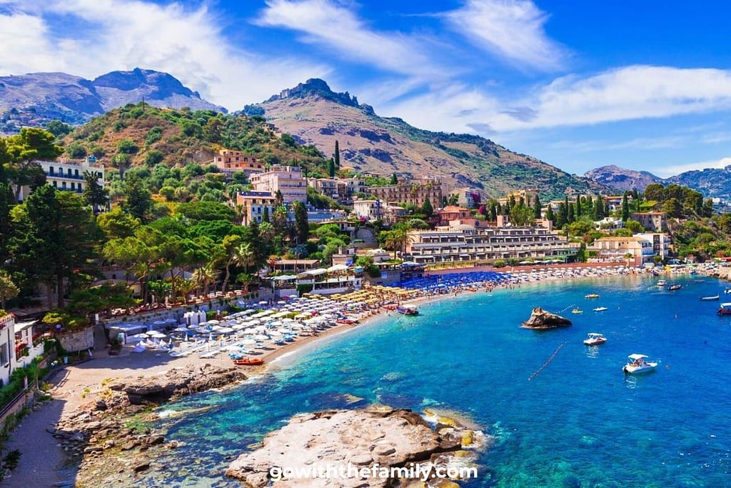 sicily-taormina-family-beach-1200x800 | Go With The Family Taormina beach in Sicily with turquoise water and scenic coastal town views