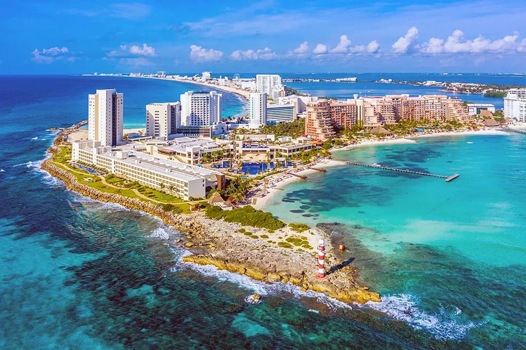 cancun-hotel-zone-map-aerial-1200x800 | Go With The Family Aerial view of Cancun Hotel Zone showing coastline and resort layout