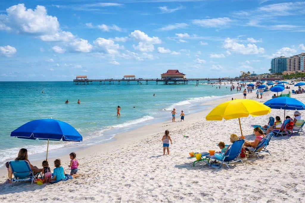 clearwater-beach-florida-family-friendly-pier-60-1 | Go With The Family Clearwater Beach Florida with soft white sand, calm turquoise water, and Pier 60 in the background
