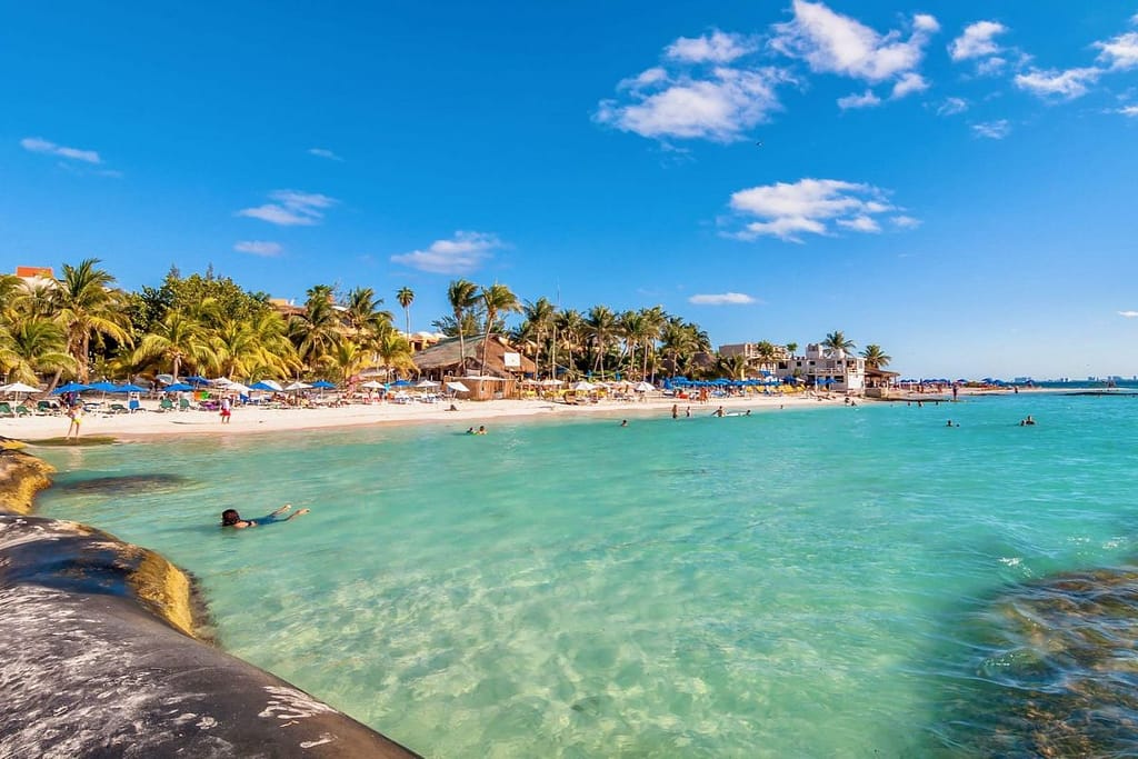 isla-mujeres-playa-norte-family-beach-1200x800 | Go With The Family Playa Norte in Isla Mujeres with shallow turquoise water perfect for families with kids