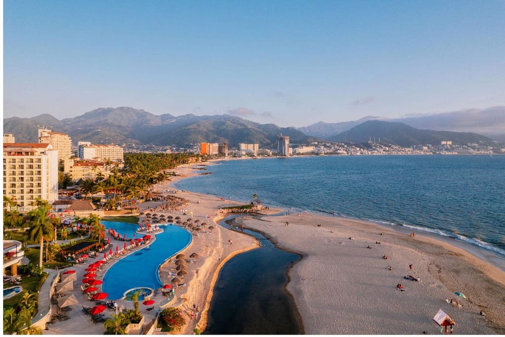 mexico-pacific-coast-puerto-vallarta-family-1200x800 | Go With The Family Puerto Vallarta beach on Mexicoβs Pacific coast with mountains and family-friendly resorts