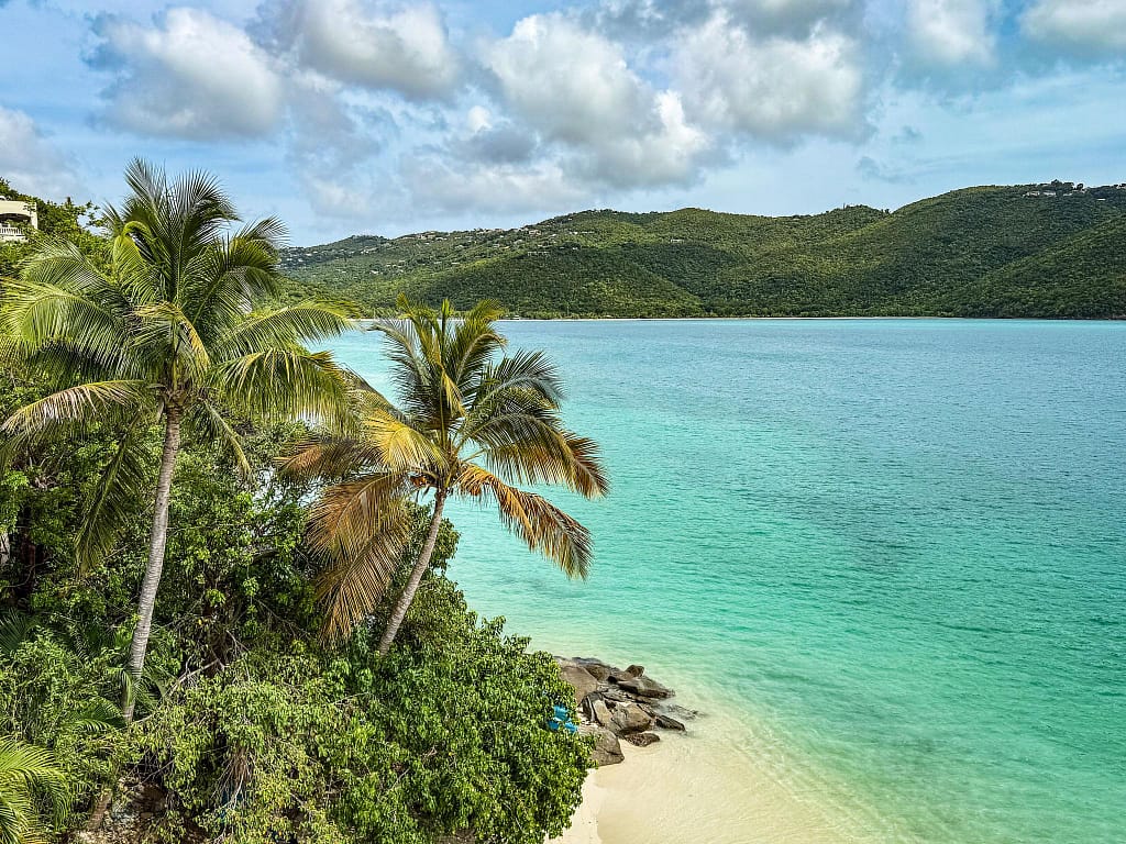 magens-bay-st-thomas | Go With The Family Magens Bay in St Thomas with calm turquoise water and a curved bay surrounded by green hills, ideal for families
