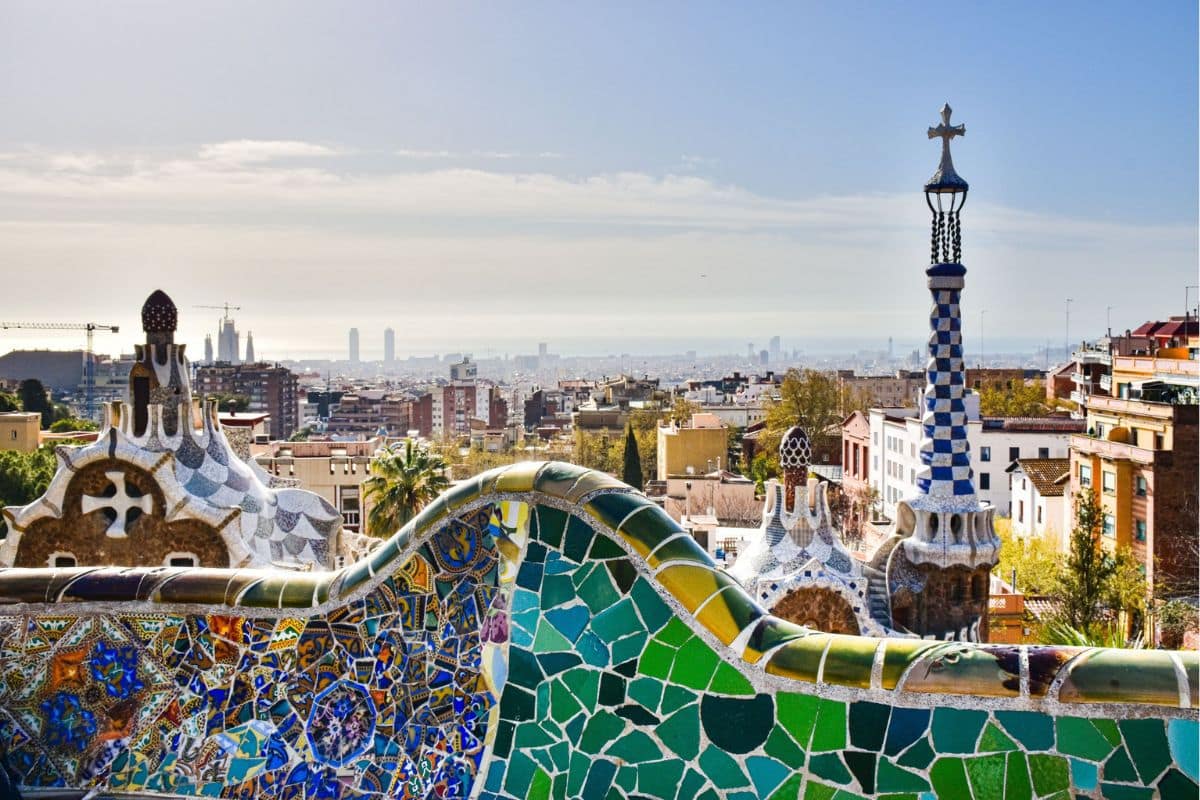 barcelona-park-guell-family-travel-1200x800 | Go With The Family Families exploring the colorful mosaics and scenic viewpoints of Park Güell in Barcelona, Spain.