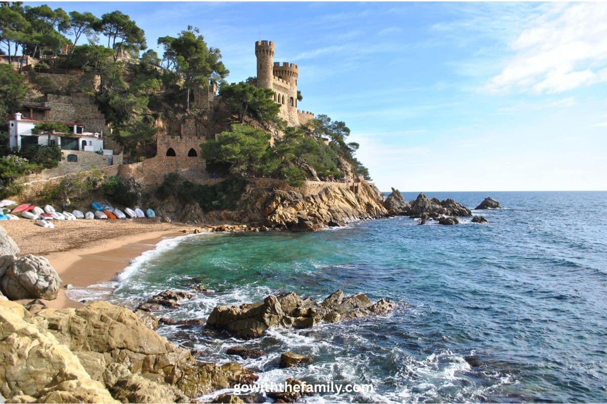 costa-brava-family-beach-spain | Go With The Family Costa Brava coastline with castle and family-friendly beach in Spain