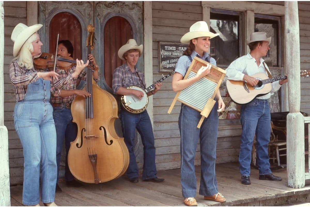 Appalachian Music Along the Blue Ridge Parkway | Go With The Family Appalachian musicians playing fiddle, banjo, upright bass, washboard and guitar together on a wooden porch