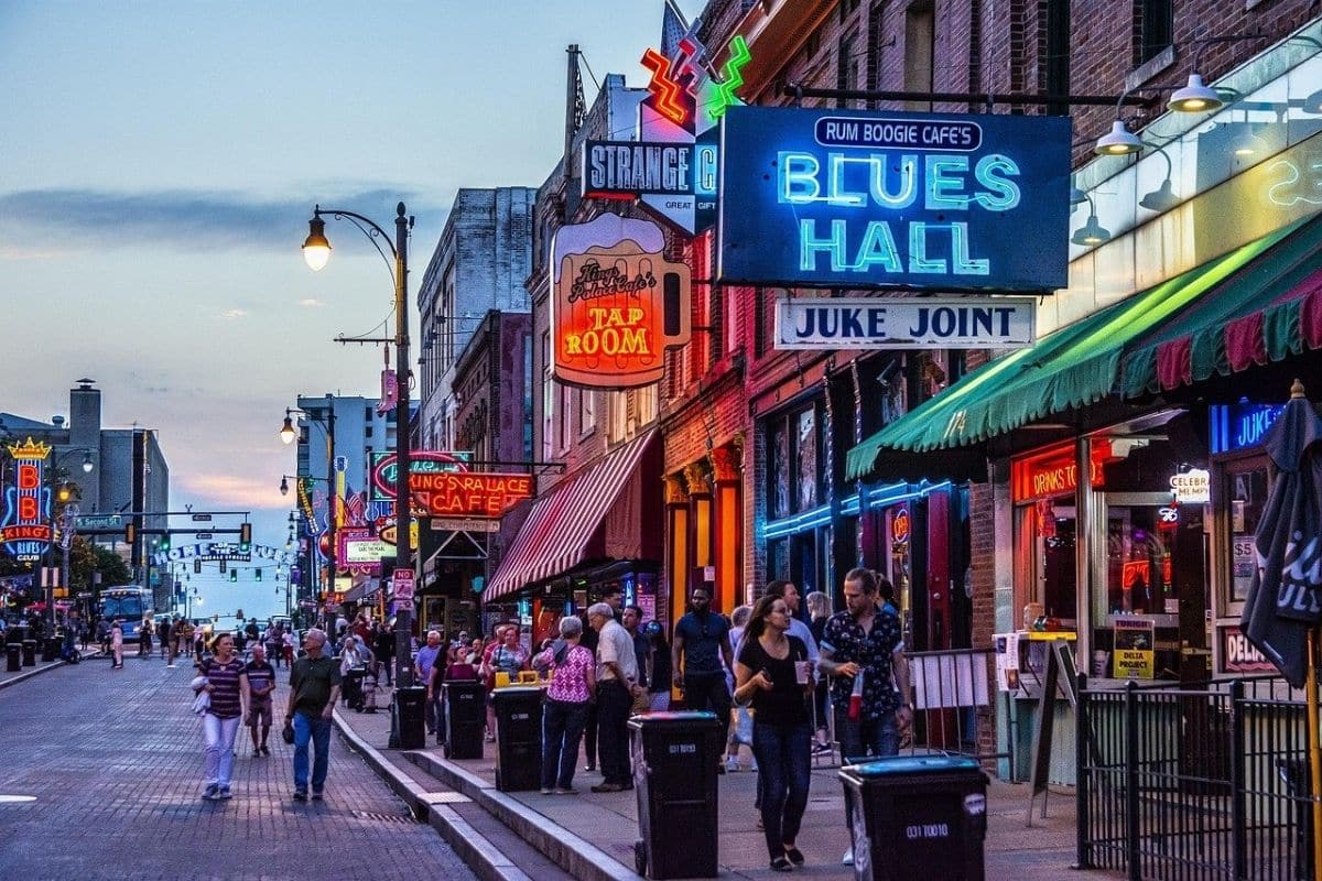 Beale Street in Memphis, Tennessee | Go With The Family Beale Street in Memphis, Tennessee, with colorful blues clubs and neon signs