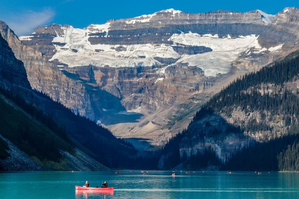 canadian-rockies-family-road-trip-lake-louise-1200x800 | Go With The Family Red canoe on turquoise Lake Louise beneath Victoria Glacier in the Canadian Rockies, Alberta