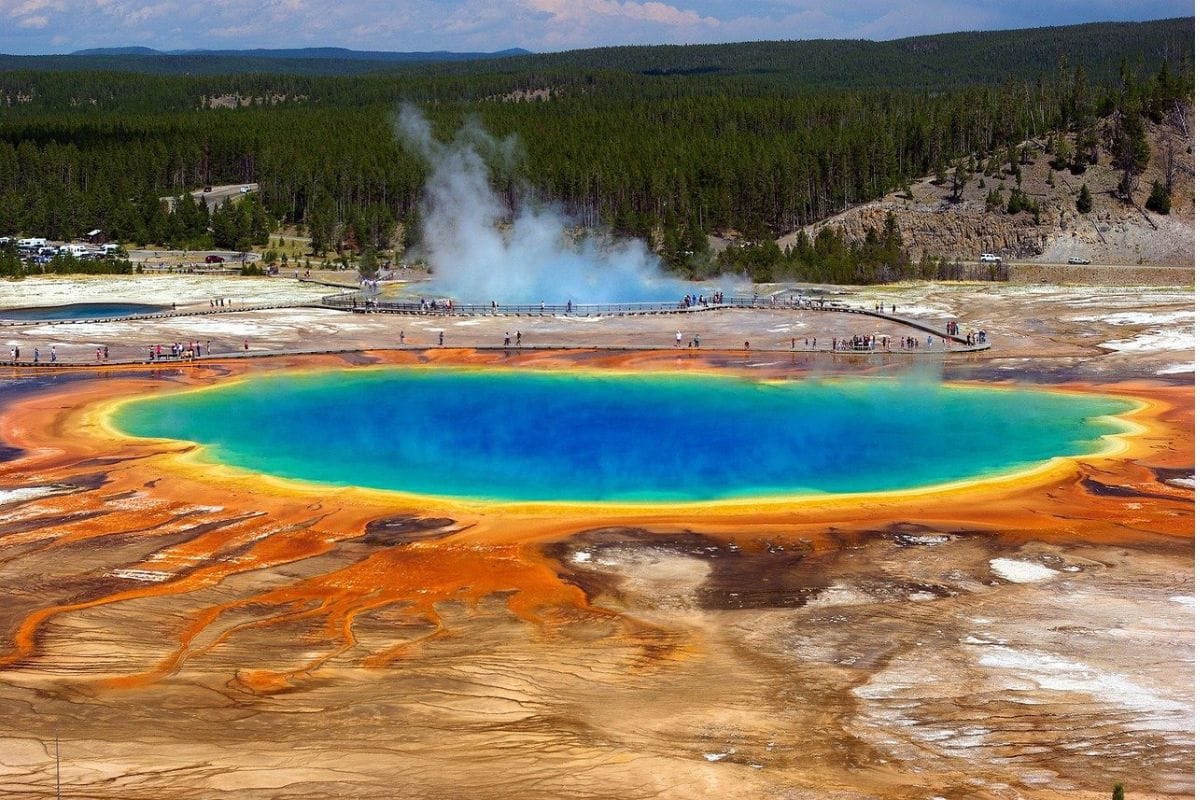 Grand Prismatic Spring — Yellowstone National Park | Go With The Family Alt text: Grand Prismatic Spring viewed from above in Yellowstone National Park