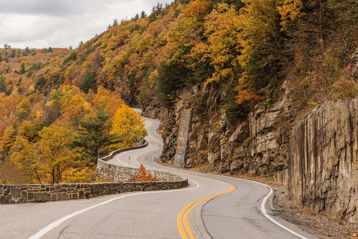 Kancamagus Highway in Autumn | Go With The Family Winding Kancamagus Highway through autumn foliage in the White Mountains of New Hampshire
