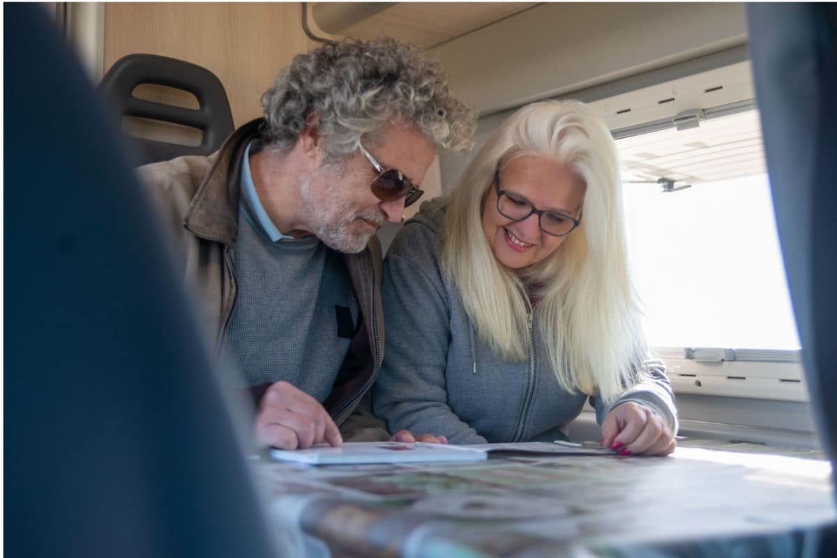 Mum & Dad Travel Essentials | Go With The Family Parents planning their next adventure together while traveling.