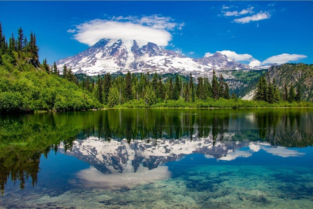 Reflection Lakes — Mount Rainier National Park | Go With The Family Mount Rainier reflected in the calm water of Reflection Lakes in Mount Rainier National Park