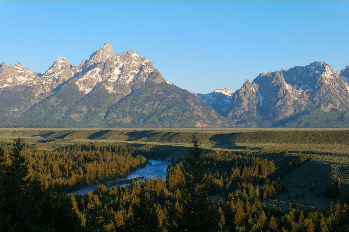 Snake River and the Teton Range, Grand Teton National Park | Go With The Family Snake River winding through the valley beneath the Teton Range in Grand Teton National Park