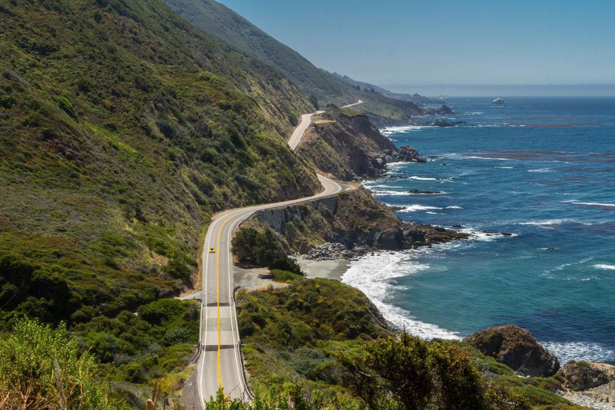 Highway 1 Along the Big Sur Coast | Go With The Family Highway 1 winding along the rugged Big Sur coastline beside the Pacific Ocean in California