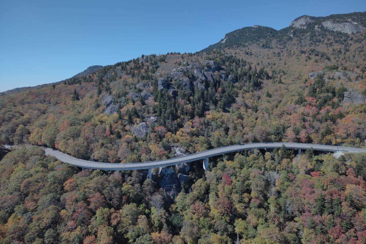 Linn Cove Viaduct on the Blue Ridge Parkway | Go With The Family Linn Cove Viaduct curving around Grandfather Mountain along the Blue Ridge Parkway in North Carolina