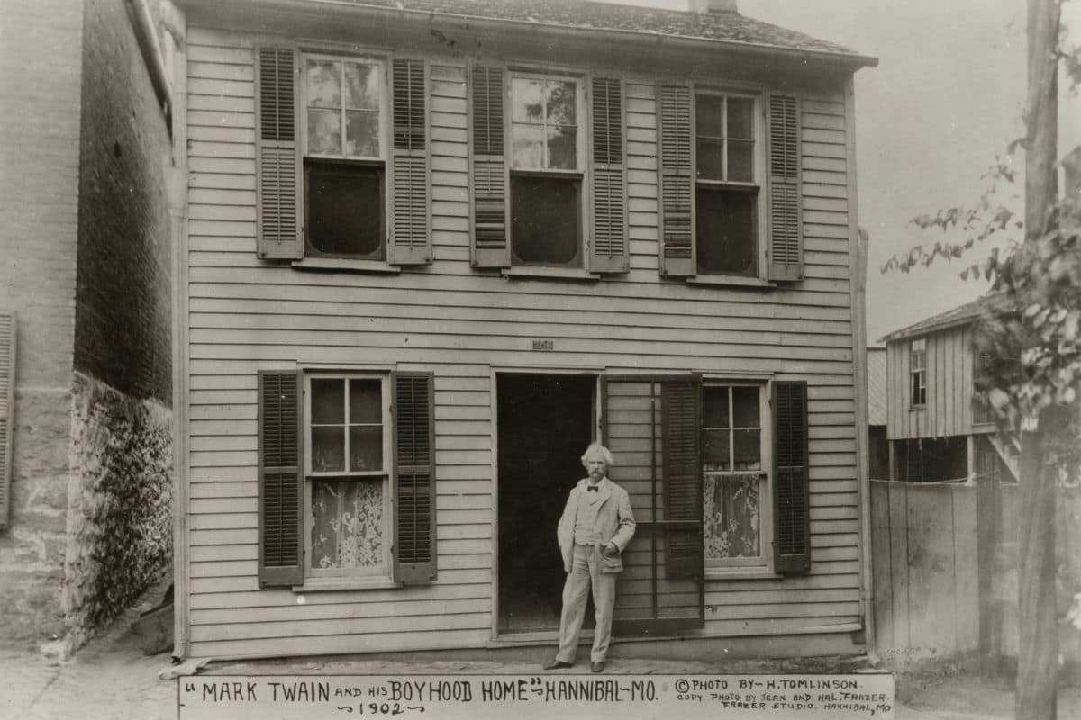 Mark Twain at His Boyhood Home in Hannibal | Go With The Family Mark Twain standing outside his boyhood home in Hannibal, Missouri, in 1902