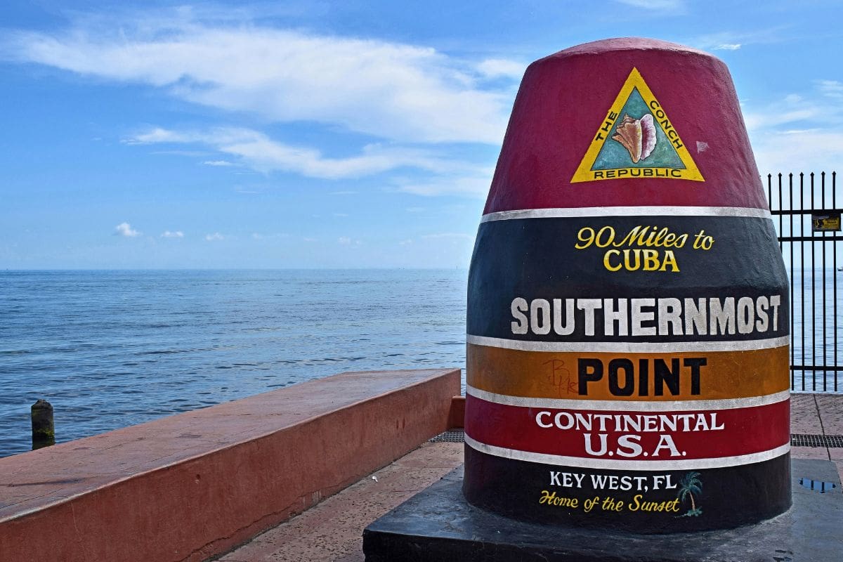 Southernmost Point in Key West | Go With The Family Southernmost Point buoy overlooking the ocean in Key West, Florida
