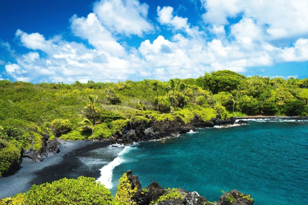 Waiʻānapanapa Black Sand Beach, Maui | Go With The Family Black sand beach and volcanic coastline at Waiʻānapanapa State Park in Maui, Hawaii